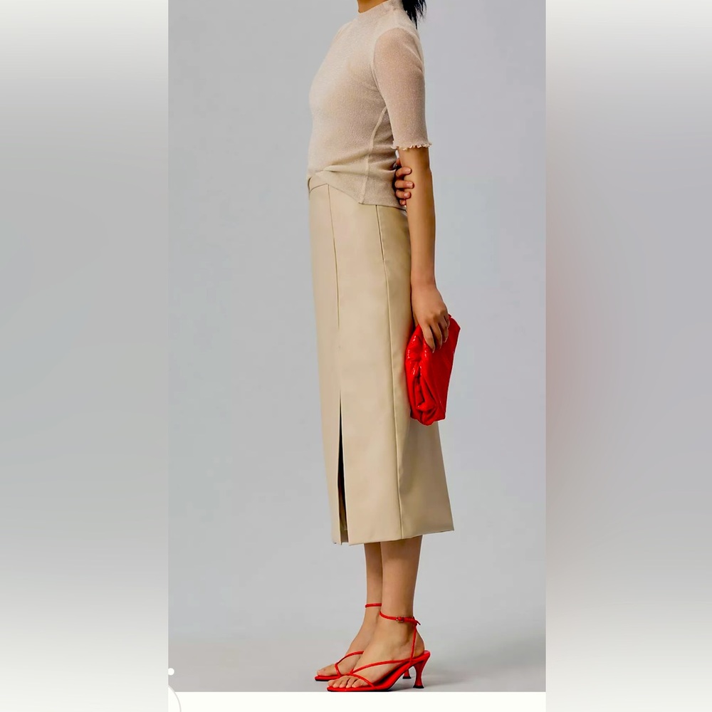 Never worn. Anthropologie XL tan/khaki leather skirt with side slit